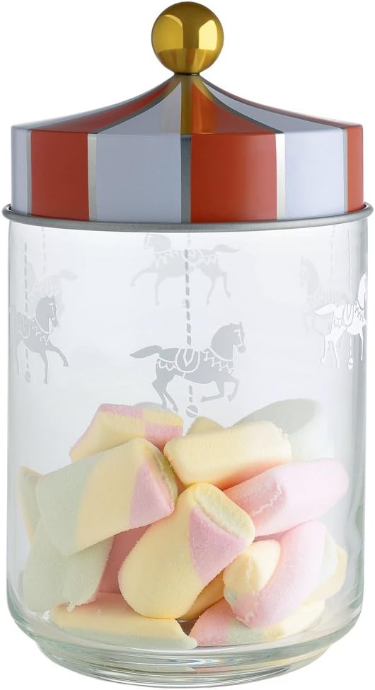 A glass jar with a colorful striped lid containing pastel-colored marshmallows, featuring carousel horse designs etched on the jar.