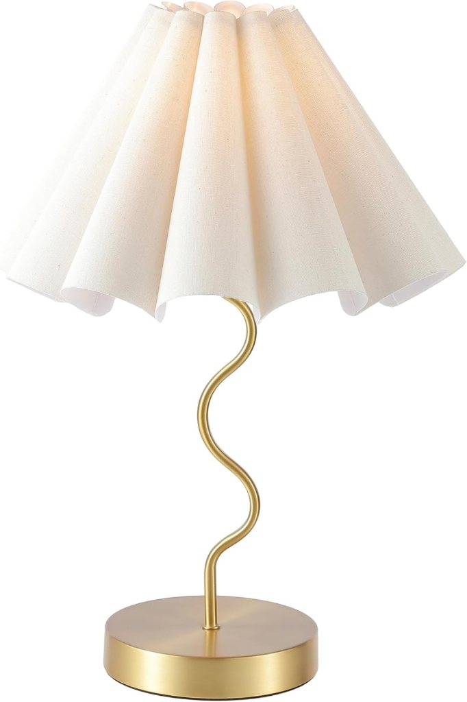 A modern table lamp featuring a curved gold base and a white fabric shade with pleated design.