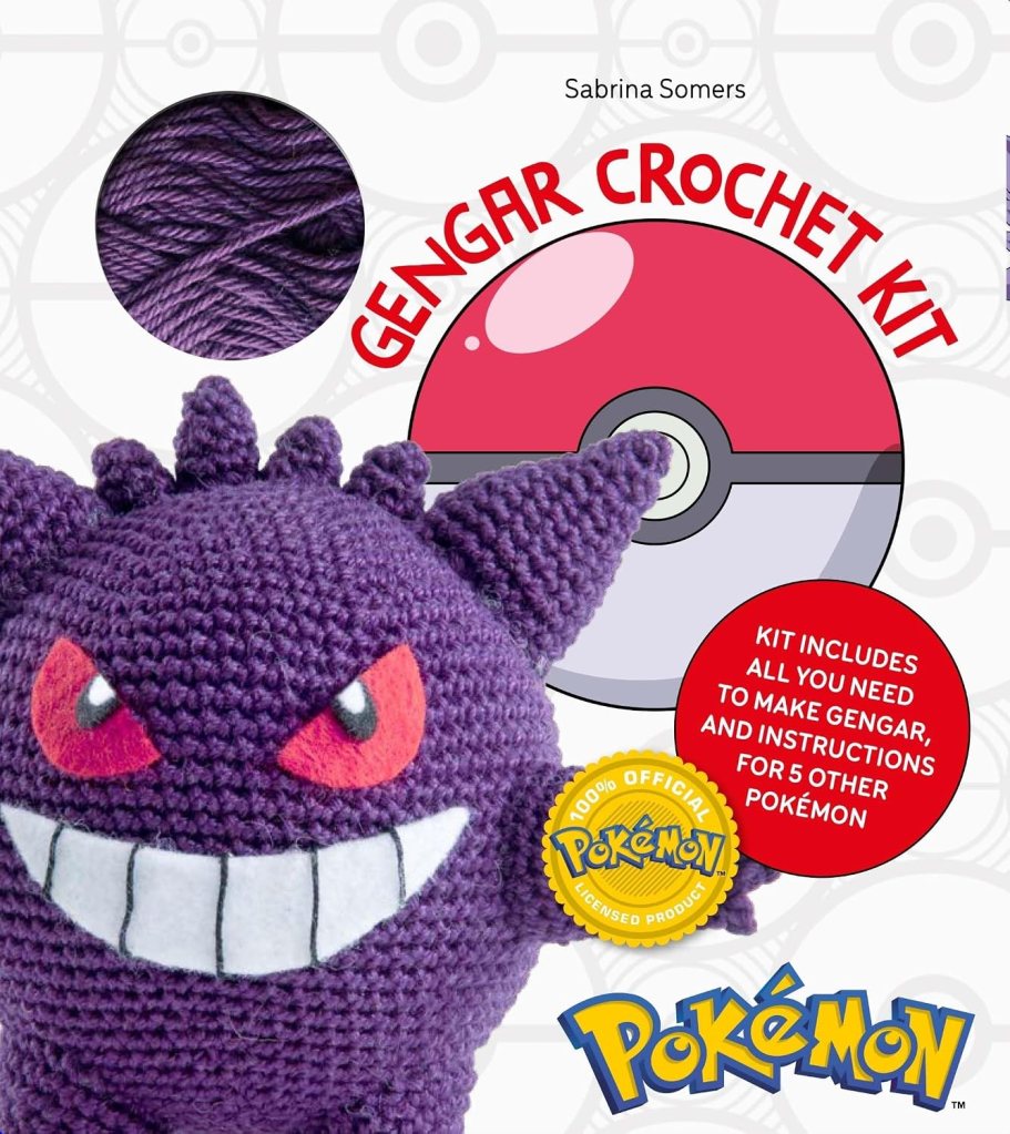 Gengar Crochet Kit packaging featuring a crocheted Gengar plush, a ball of purple yarn, and promotional text highlighting kit details.